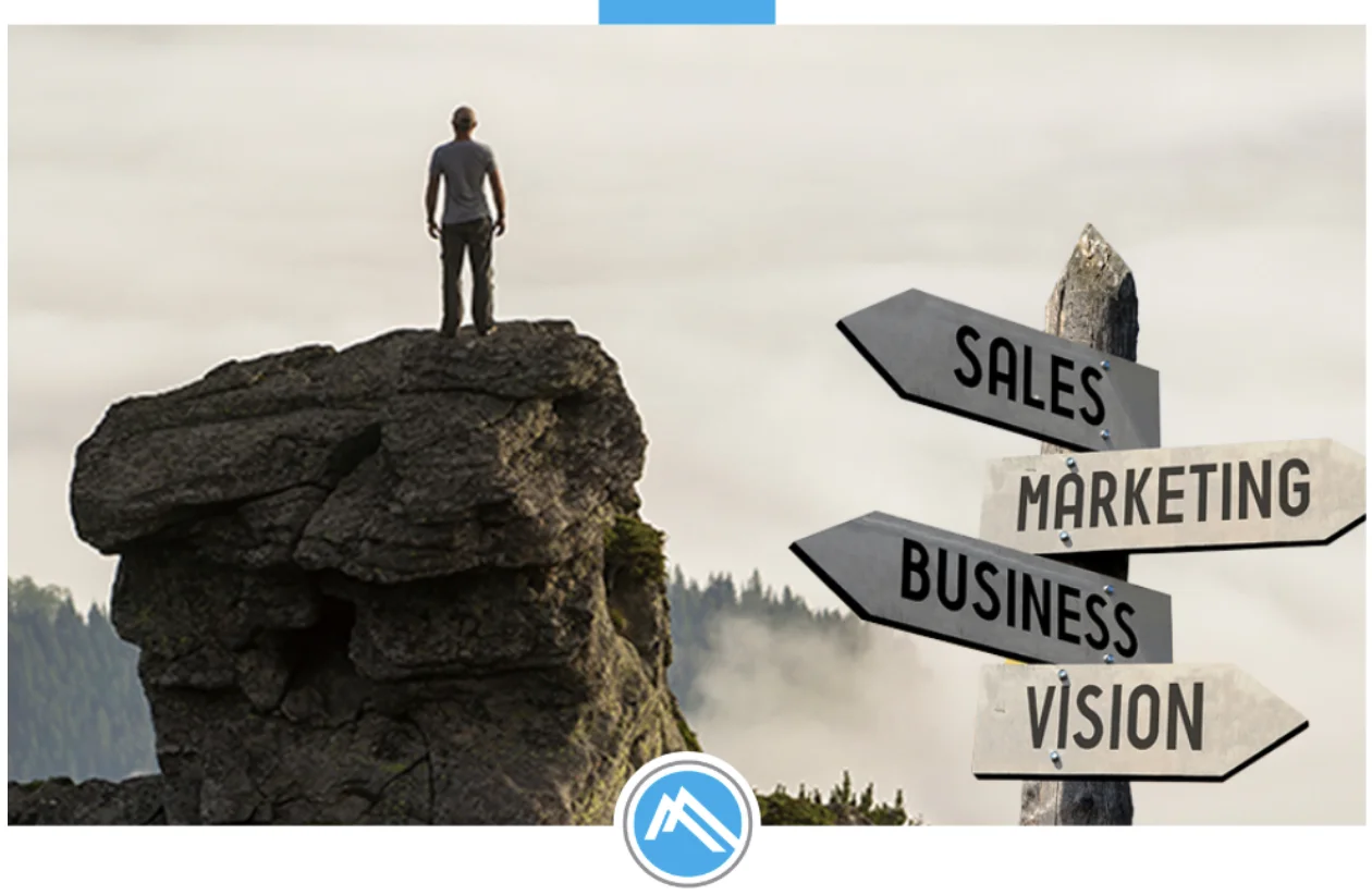 A man standing at the top of mountain at the crossroads of the new rules for marketing in 2025